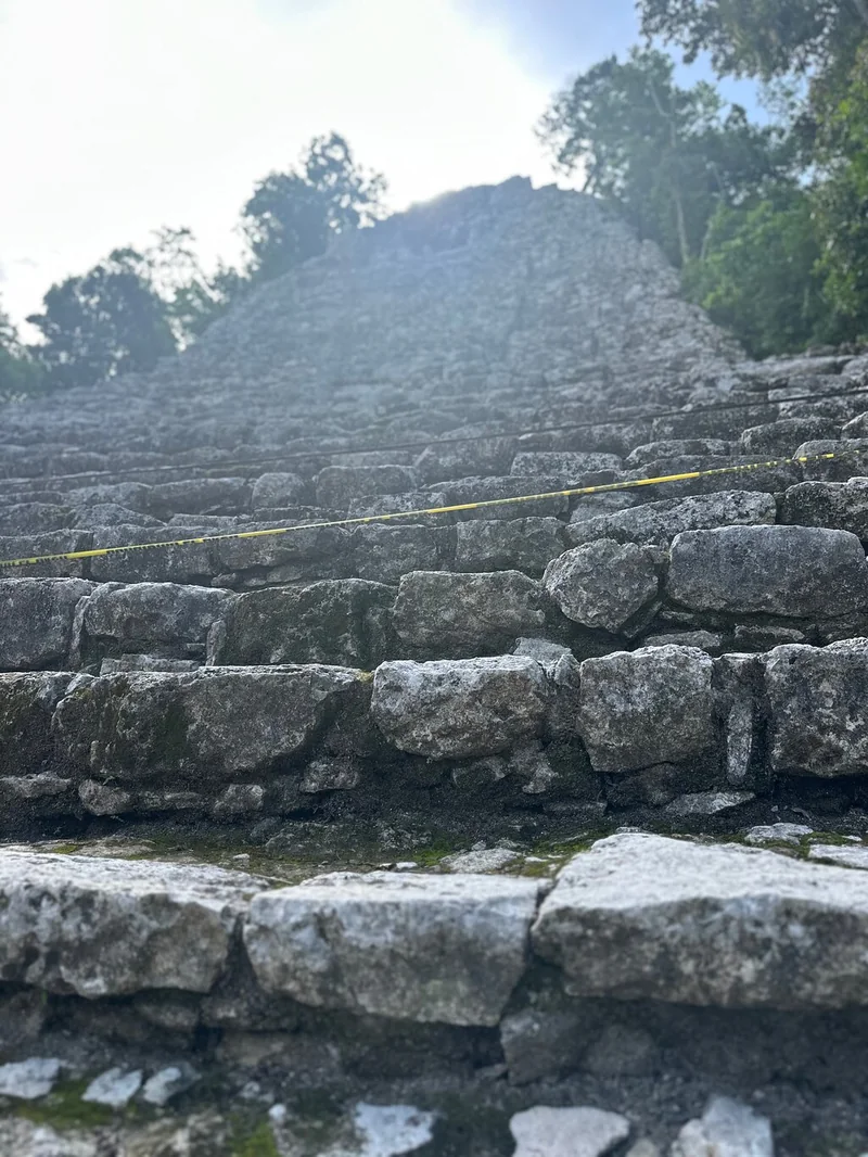 Close view of weathered stone steps of a Coba pyramid